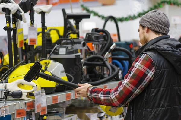 Fototapeta Man in a hardware store