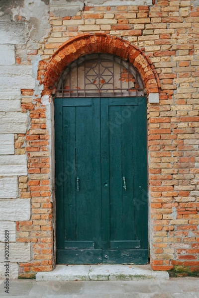 Fototapeta Old door in Venice, Italy