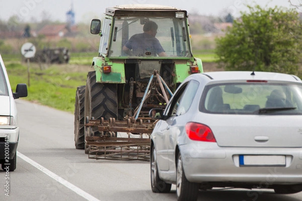 Fototapeta tractor on the road