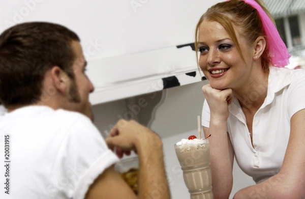 Fototapeta Couple sharing sodas