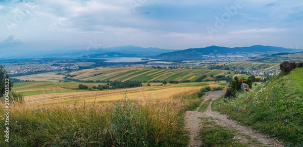 Obraz Beautiful sunset view on Orava villages and Orava dam with Rohace hills on the background from Klin, Slovakia
