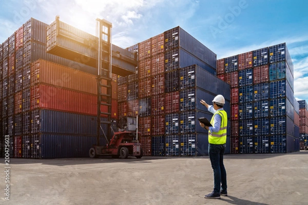 Fototapeta Foreman control loading Containers box from Cargo