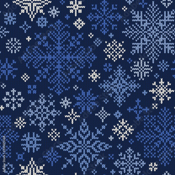 Fototapeta Seamless knitted pattern of blue and white snowflakes