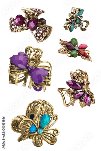 Fototapeta Hair clips for women. Six different shapes of hair clips with colorful semiprecious stones, isolated on  white background, clipping paths included