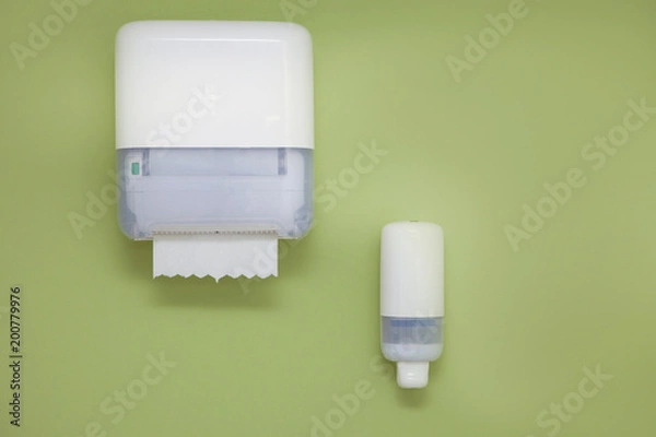 Fototapeta Hand hygiene products Dispensers for soap and towels in public toilet
