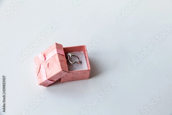 Obraz pink gift box with ring