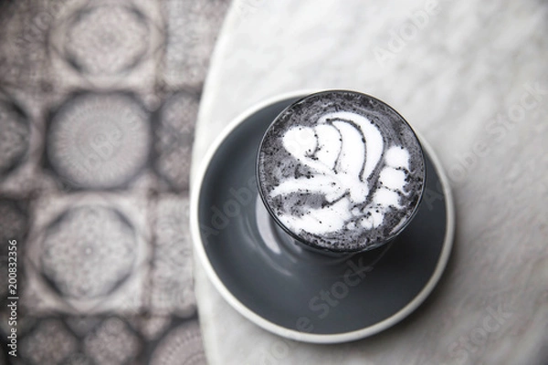 Fototapeta Charcoal super latte on marble background.