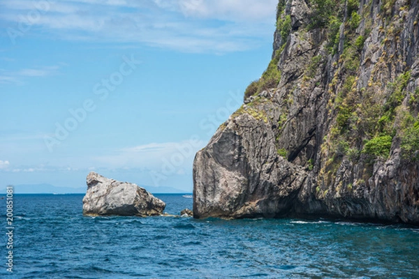 Fototapeta Cliff over sea surface close-up