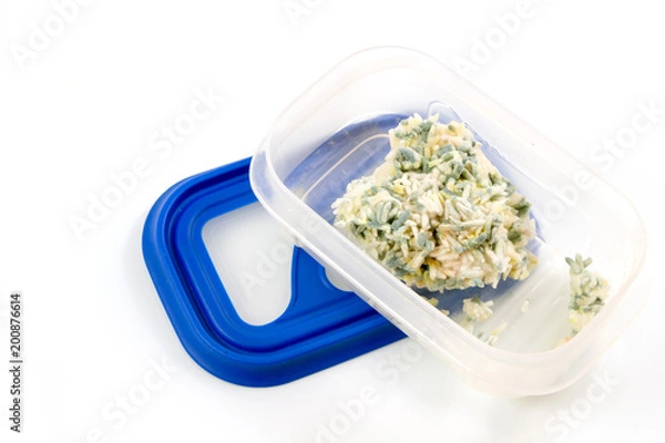 Fototapeta Mould on rice, moldy on food in a box food isolated on white background.