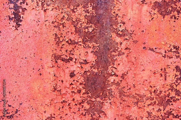 Obraz A sheet of old rusty metal painted with red cracked paint. Abstract background. Metallic background.