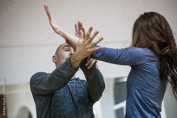 Fototapeta two dancers improvise. contemporary dance performing