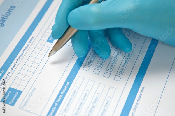 Obraz Doctor Completing Blood Test Form