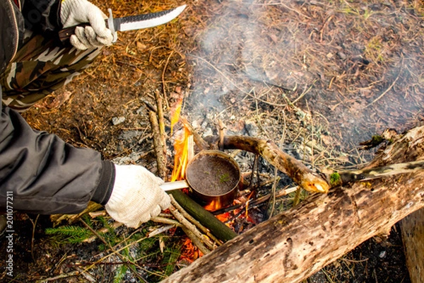 Obraz Making tea at the stake during a hike
