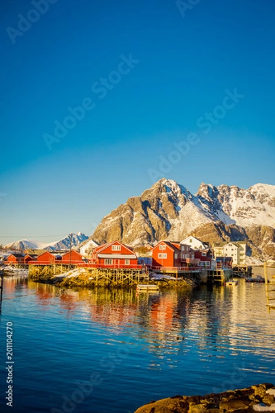 Obraz View of many wooden houses in the shore of Henningsvaer in Lofoten islands