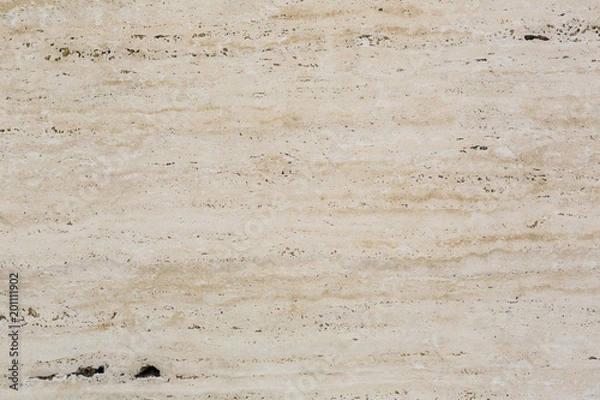 Fototapeta Wall of travertine with stone layers of different colors. Close up architecture macro photography. Creative wallpaper photography.