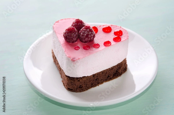 Fototapeta nice small cake in the form of heart  on the table