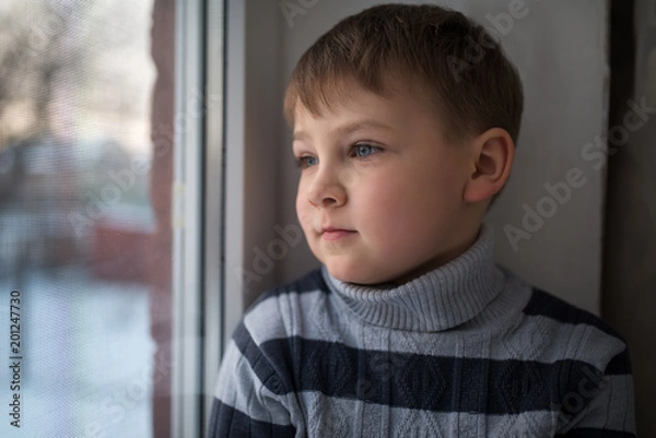 Fototapeta small boy thinking about something