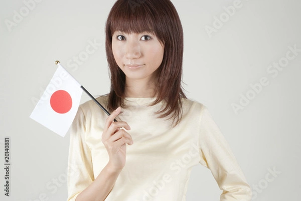 Fototapeta 日本国旗を持つ女性
