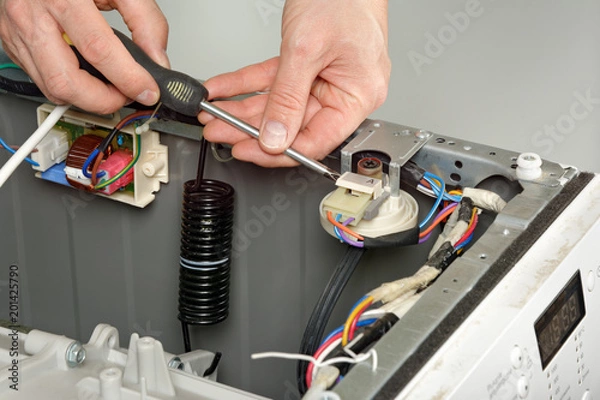 Obraz Naprawa, serwis uszkodzonej pralki