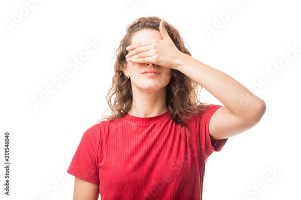 Obraz Young brunette covering her eyes
