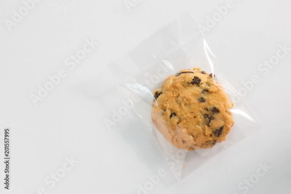Fototapeta Cookie in plastic wrap packaging.