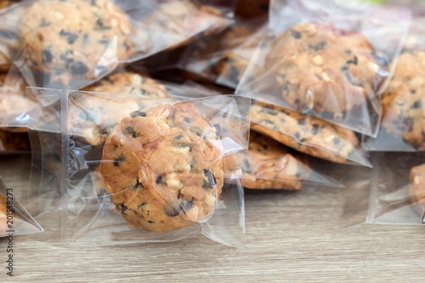 Fototapeta Cookie in plastic wrap packaging.