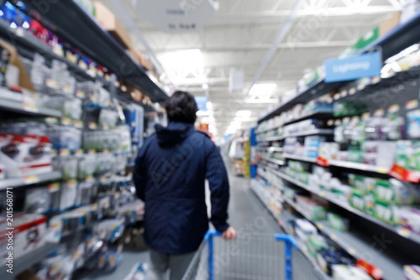 Obraz Blurred mart shop store background with customer shopping interior