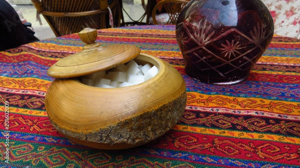 Obraz Sugar on Table With Turkish Tapestry Tablecloth