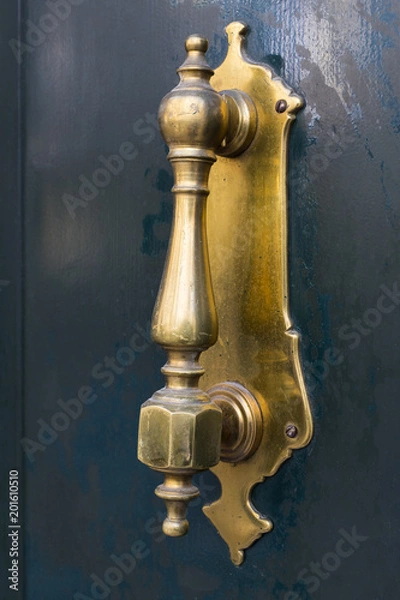 Fototapeta Door knocker close-up on a wooden wall 