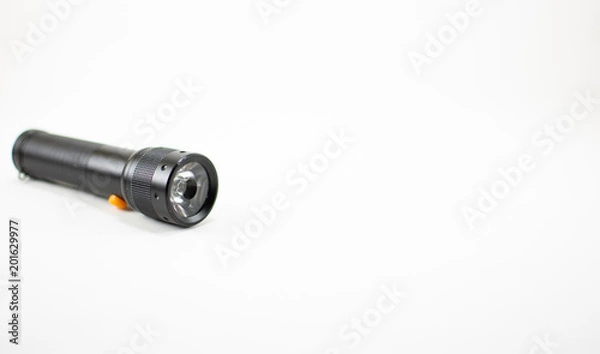 Fototapeta Black flashlight on white background. isolated.