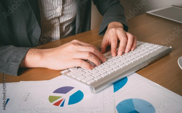 Fototapeta woman's hands working in office