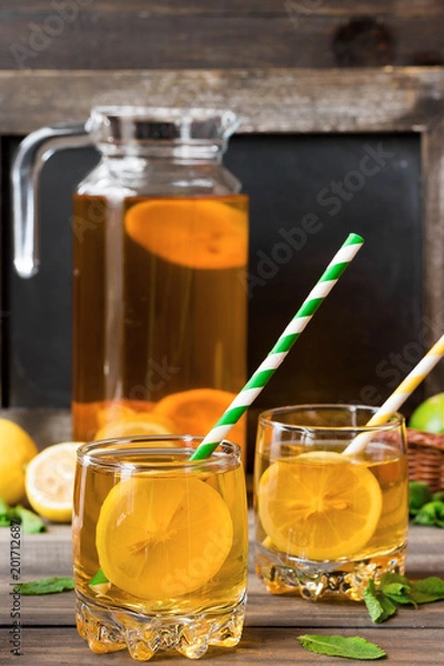 Fototapeta Refreshing cold tea with lemon