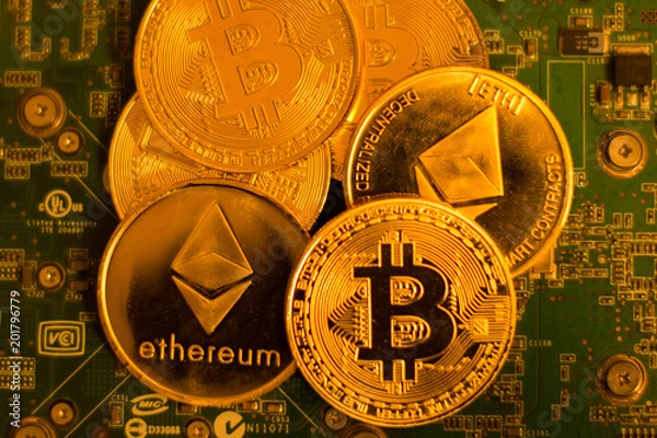 Obraz Bitcoin and Etherium on a circuit board