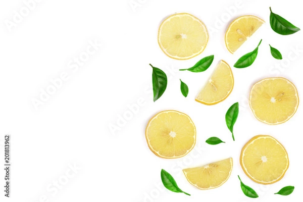 Fototapeta Slices lemon decorated with green leaves isolated on white background with copy space for your text. Flat lay, top view