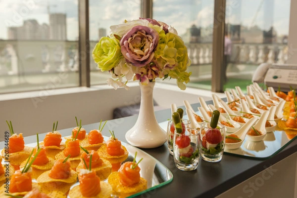 Fototapeta holiday table with snacks