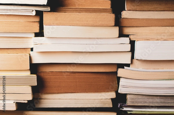 Fototapeta Multiple Stacks of Books Background