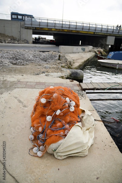 Fototapeta gathered fish net