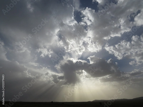 Obraz Sun rays through clouds 2