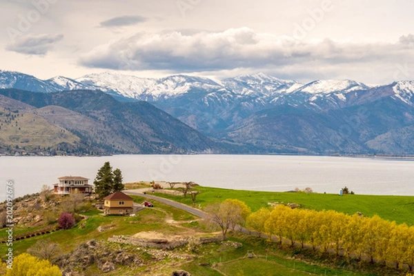 Fototapeta Overcast skies with big clouds over Lake Chelan