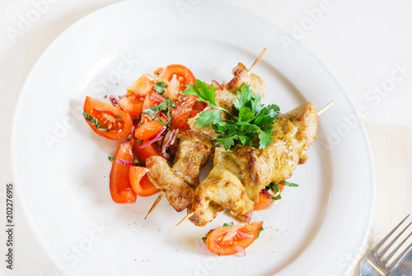 Fototapeta Chicken skewers with vegetables