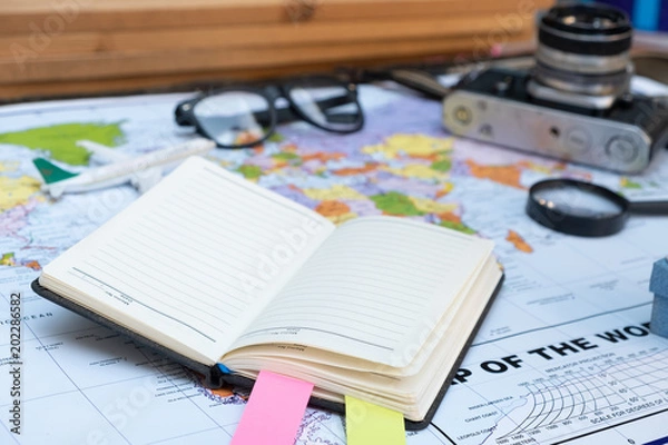 Fototapeta travel concept styles with map book grasses tag and camera