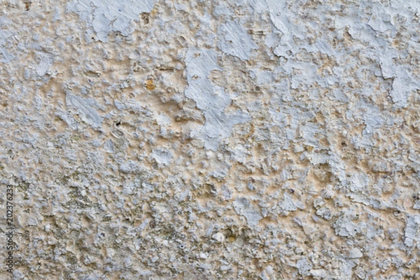Fototapeta Concrete wall with white, beige and blue layers background texture photos