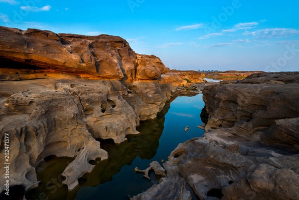 Fototapeta Beautiful sunset at Grand canyon of Thailand. stone mountain at Sam Phan Bok  Ubonratchathani province  Thailand.Nutural for background.