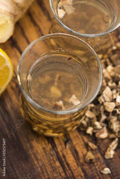 Obraz Teaglass with yellowhead root tea