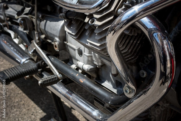 Fototapeta Close Up of the Chrome Parts of an Engine of a Custom Motorbike