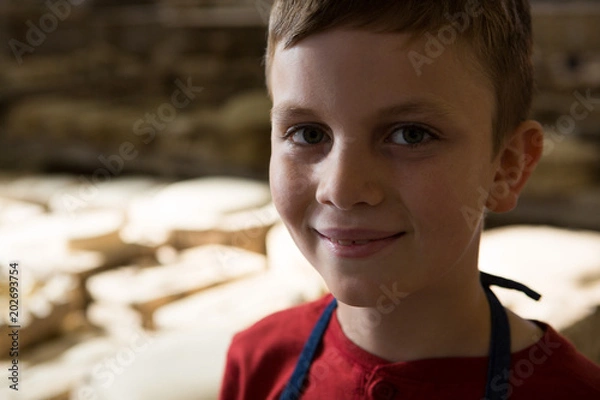 Obraz Smiling boy in pottery workshop