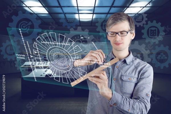 Fototapeta Virtual reality in engineering concept. Male / man wearing shirt and glasses making measurements with ruler and pencil and constructing turbine on the virtual screen on futuristic background