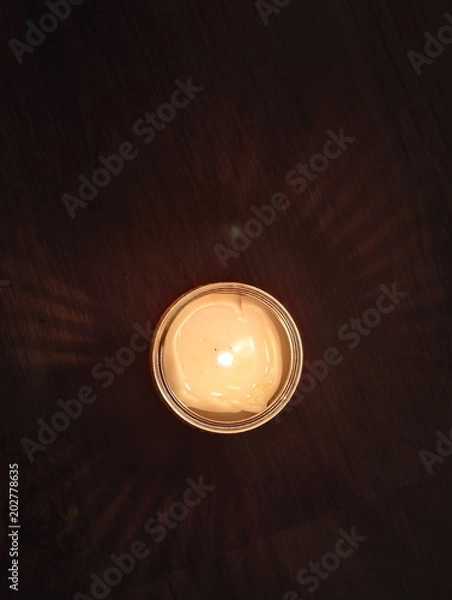 Obraz Direct shadow around candle
