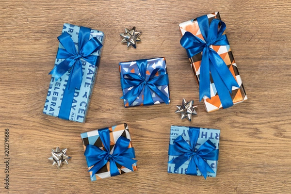 Obraz Gift boxes composition on wooden table.