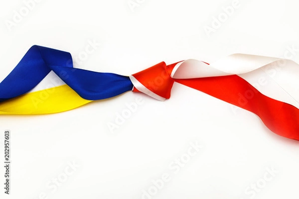 Obraz red blue white yellow black conflict between Ukraine Poland two flag top view hand right sector confrontation